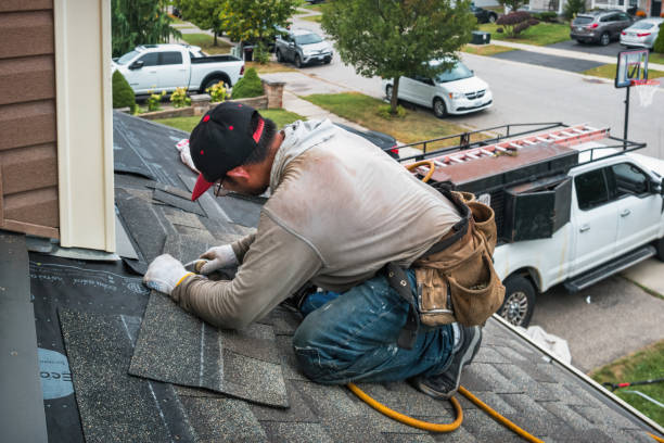 Professional Roof Replacement technician working in Colrain, MA